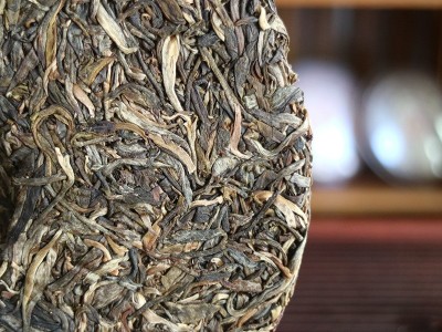 永明茶厂新款班盆古树茶普洱生茶357g勐海茶区普洱茶叶七子饼茶图2