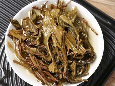云南普洱茶七子饼 昔归香迷你小饼7片 手工扎笋叶56克/筒图3