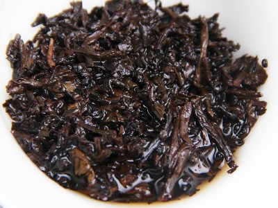 批发云南普洱茶叶 七子饼茶金芽小饼 熟茶 宫廷普洱茶饼图4